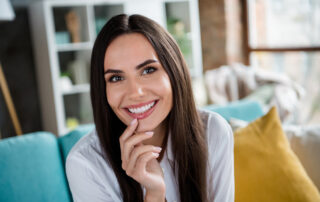 Young woman smiling with veneers